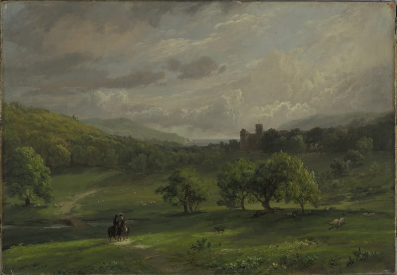A green valley under a grey sky, with a rider on the track, trees in the middle distance and Lulworth Castle small among them.